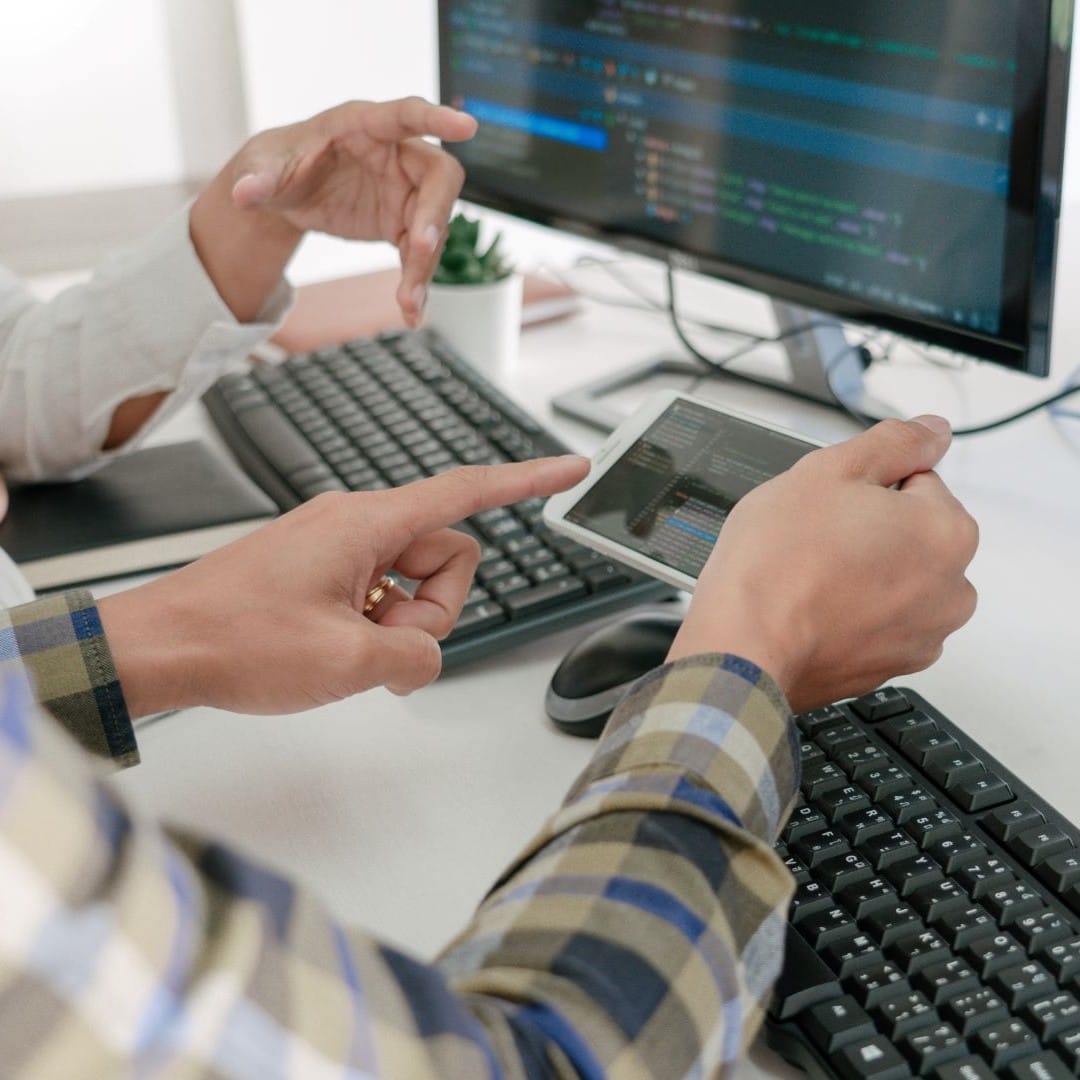 IT technicians working on computer